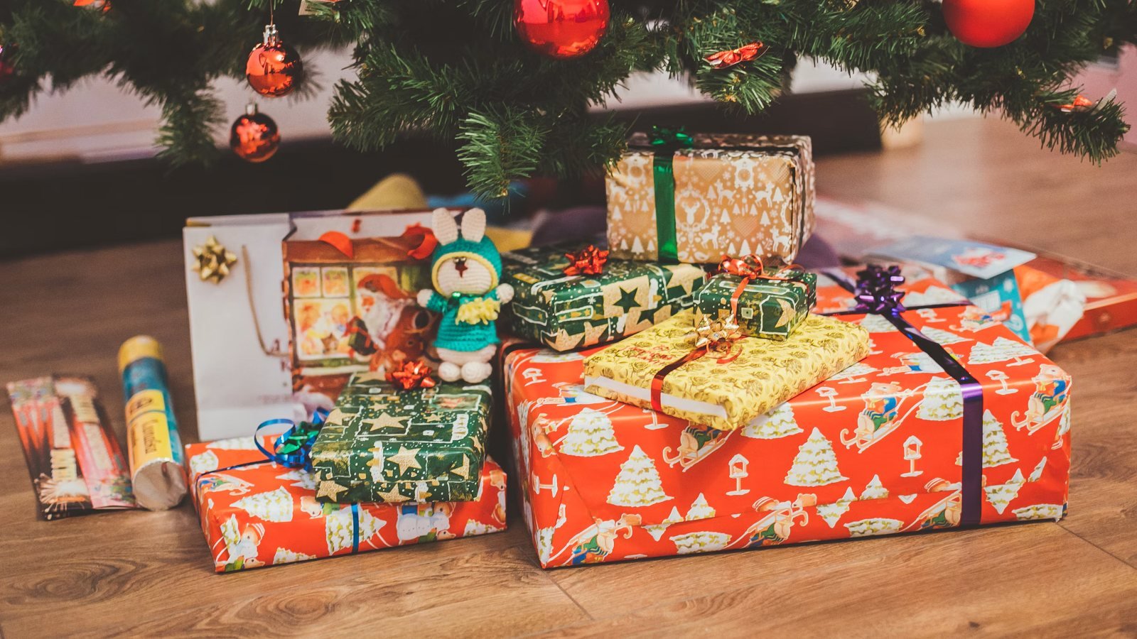 Christmas gifts for movie lovers wrapped under the tree