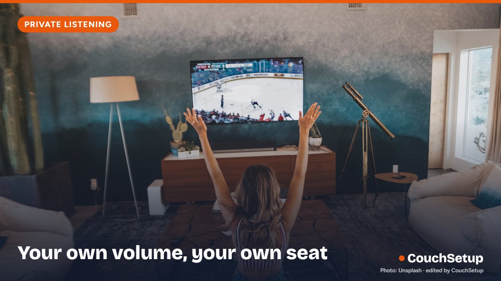 Someone watching sports with earbuds in