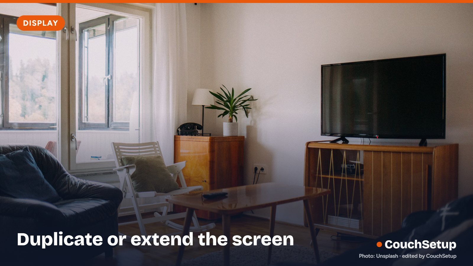 A laptop screen extended onto a TV